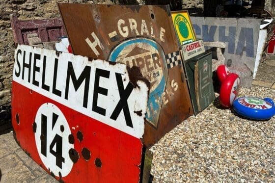 Enamel signs at automobilia auction