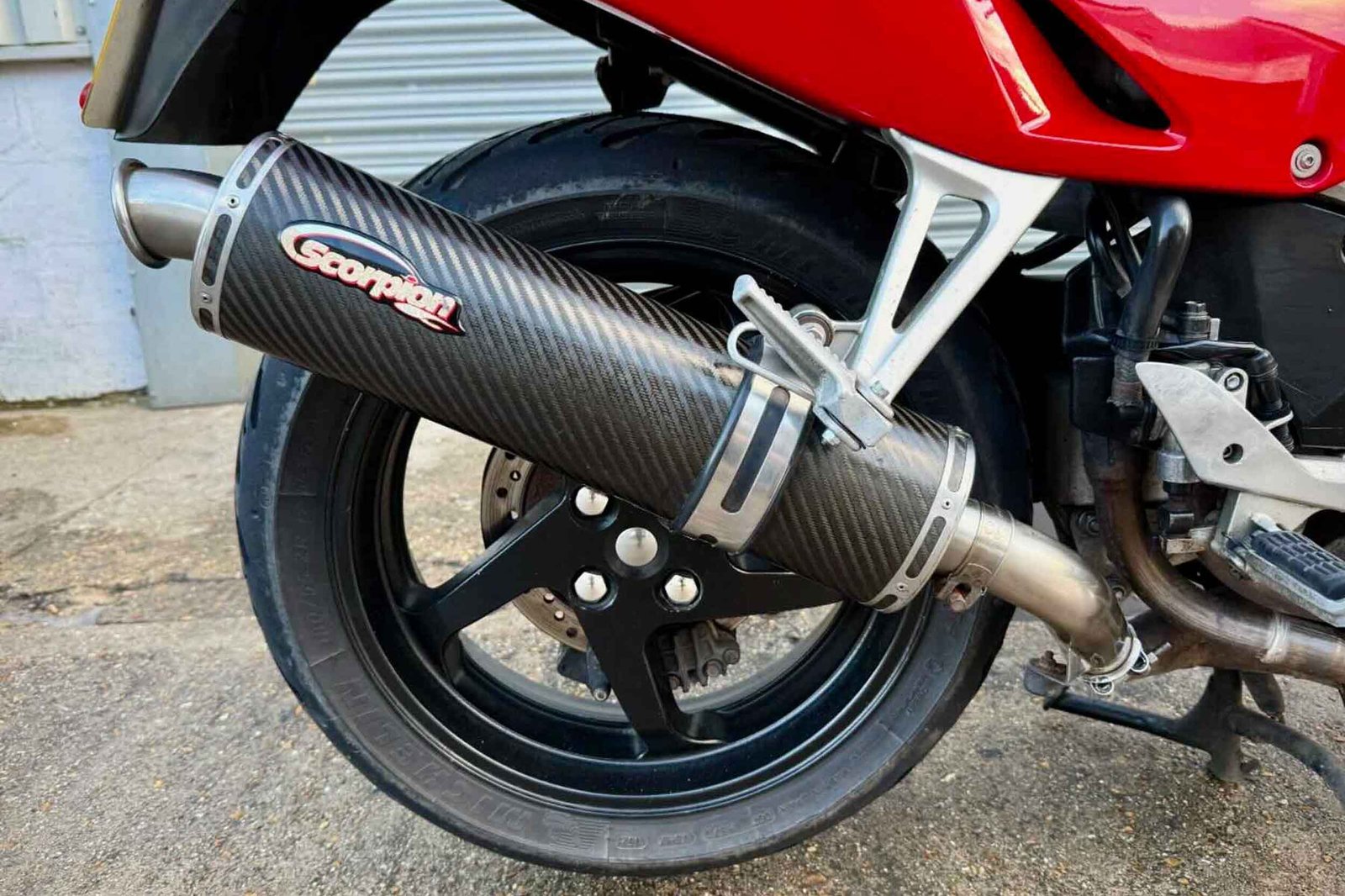 Aftermarket exhausts aren't automatically banned - but emissions must be up to scratch. However, this 1998 Honda VFR800 pre-dates the cut-off date of 2001